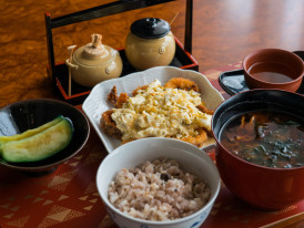 Traditional Buddhist temple meal with seasonal vegetables and grains. Photo by Richard Iwaki on Unsplash
