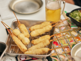 Fresh kushikatsu skewers at a traditional restaurant.