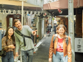 Narrow alley in Tenma district with small traditional shops and restaurants.