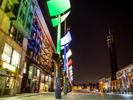 Colorful Smithfield Square at night, where the hip spend their time