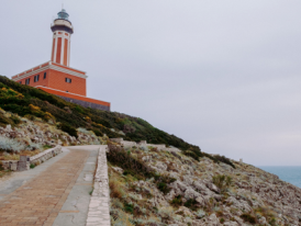 Fortini path above coves toward Punta Carena lighthouse