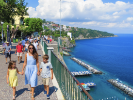 Family walking along Villa Communalle Park