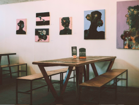 Small contemporary art gallery space with minimalist design in Milan