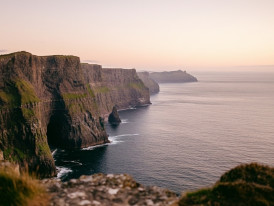 Expansive views of the Cliffs of Moher with the Atlantic and Aran Islands