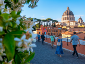 Early morning light on St. Peter's dome from a city terrace