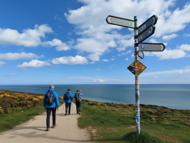 Cliff path above Howth with sea views and walkers on the trail