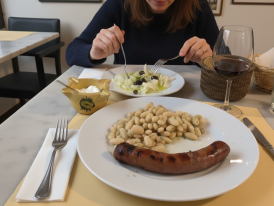 Grilled sausage on white beans