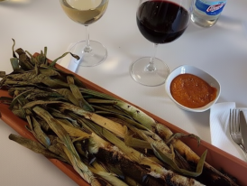 Charred calçots with romesco sauce
