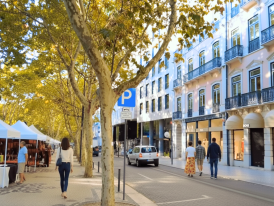 Tree-lined Avenida da Liberdade with designer shops and grand buildings
