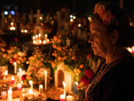 November sunset over Mexico City with altar candles in foreground