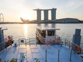 Early morning calm at Marina Bay, soft light over the river