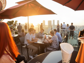Marina Bay Sands rooftop bar with a sunset view