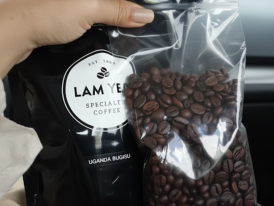 A bag of freshly ground coffee and beans at Lam Yeo Coffee Factory