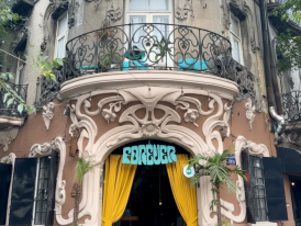 Art Deco doorway on a shaded Roma side street