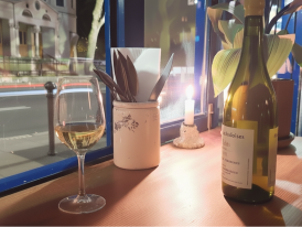 107 Wine Shop & Bar at night with a street view 