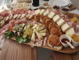 Italian cheese and charcuterie board with aged selections and cured meats