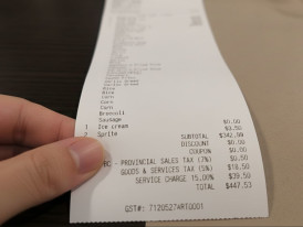 A cozy restaurant and a bill at the end of dinner