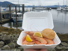 Fresh spot prawns served with lemon wedges