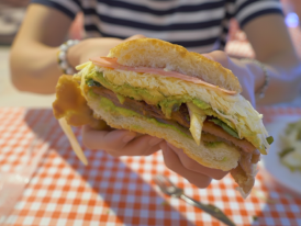 Cross-section of overstuffed cemita sandwich with layers visible
