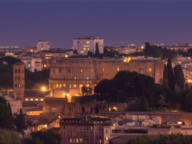 Panoramic view from Gianicolo Hill overlooking Rome's illuminated cityscape