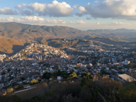 Taxco hillside of white houses and terracotta roofs