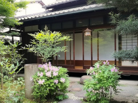 Small traditional tea house tucked into a quiet Kyoto street