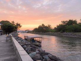 Boats on the Uji River at sunset