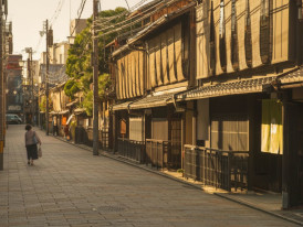Kyoto backstreet with old wooden houses and soft afternoon light