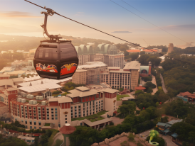 Singapore Cable Car at dusk with harbor and container ships below
