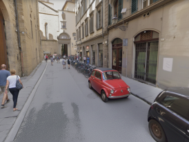 A narrow Florentine street with artisan workshops