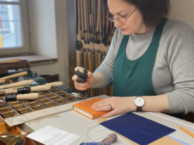 Leather artisan working in traditional Oltrarno workshop