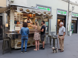 Traditional lampredotto sandwich being served from street food cart