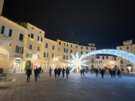 Lucca's oval piazza during winter with Christmas lights