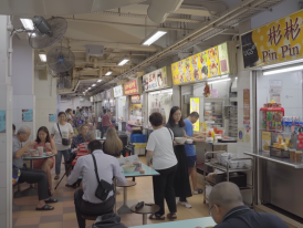 Hawker centre dinner crowd with people enjoying their food