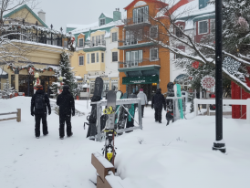 Mont Tremblant village with colorful buildings at base of a mountain