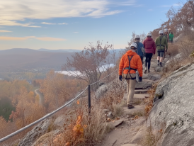 Forest hiking trail with autumn colors in Laurentian Mountains