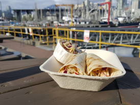 Fresh fish tacos served at Go Fish with a view of the water