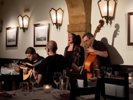 Fado singer and musicians in the Clube de Fado restaurant