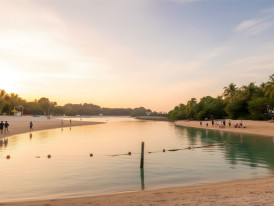 Palawan Beach morning view with clear turquoise water and few visitors