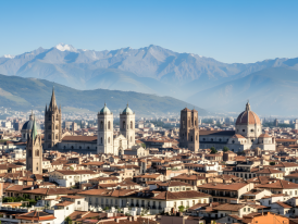 Munich city skyline with the Alps faint in the background