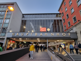 Departure board at Munich Hauptbahnhof evening light