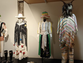 Display of traditional folk clothing and costumes inside the Corrala