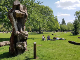 People relaxing on the grass at Victoria Park