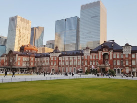 Tokyo Station Marunouchi building with plaza and surrounding skyscrapers