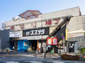 Exterior of Suzunari Theater in Shimokitazawa with signage and entrance