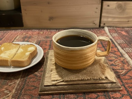 Kissaten coffee in a ceramic cup with buttered toast in Minato Ward, Tokyo