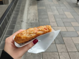 Harajuku crepe folded tight, whipped cream and strawberries peeking out