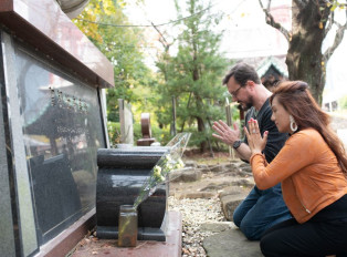 People holding hands and praying