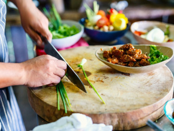 A chef prepping ingredients at a cooking class in Kyoto