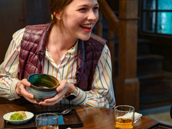 Traveler enjoying a mulit course meal on a Kyoto food t
